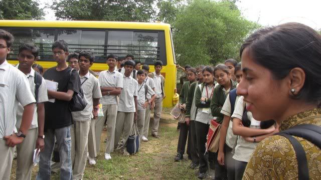 getting into the buses 281110